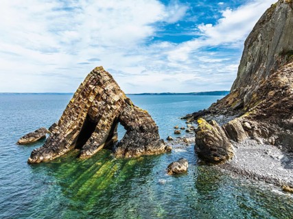 Blackchurch Rock and Cliffs over Mouthmill Beach from a drone, North Devon Coast, Devon, England,