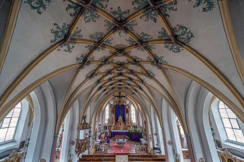 Interior with Gothic mesh vault and high altar, Holy Trinity parish church, founded in 1364,