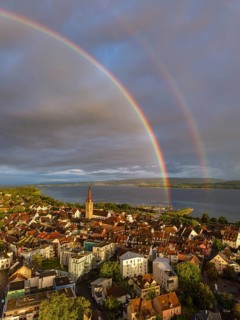Aerial view of the historic old town of Radolfzell am Lake Constance with the cathedral illuminated