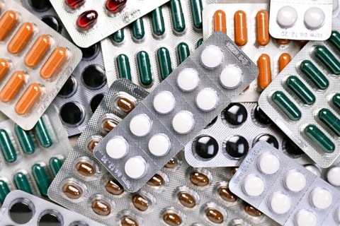 Stacked tablet blisters, icon photo of medicine and health care reform +++ editorial use only