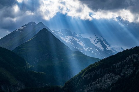 View of Grossglockner, highest mountain in Austria, Alps, rays of light, Heiligenblut am