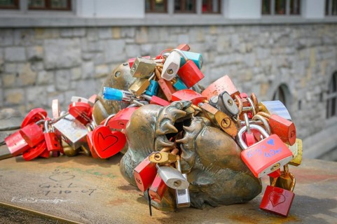 Love locks attached to a metal sculpture by Mirsad Begicby, on Butcher's Bridge, Ljubljana,