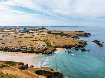 Farms and Fields over Cliffs and Porthcothan Bay from a drone, Porthcothan, Padstow, Cornwall,
