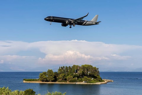 A Titan Airways Airbus A321neo aircraft with the license plate G-OATW at Corfu airport, Greece