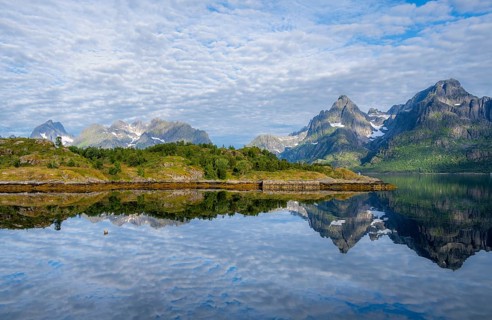 Picturesque fjord landscape at Raftsund fjord, mountains reflected in water, Vesterålen, Norway