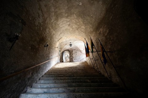 Stairway with flags, Hohenwerfen Fortress, Werfen, Pongau, Salzburg state, Austria