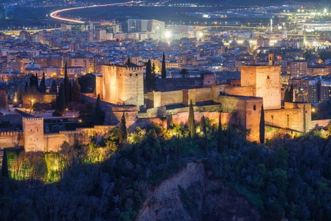 High view of Alhambra historic fortress in Granada, Spain, showing alhambra palace, fortress