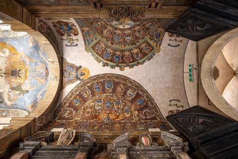 Ceiling painting with coat of arms in the entrance gate of the Palazzo dell'Archiginnasio, historic