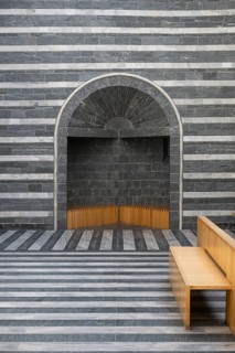 Wooden benches in niche, interior view, Roman Catholic church of San Giovanni Battista, built in