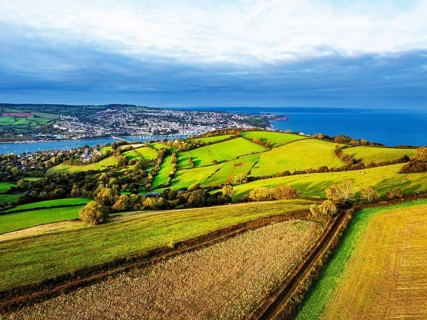 Colours of autumn Fields and Farms over Sheldon from a drone, Torbay, Devon, England, United