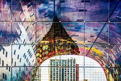 Markthal from 2014, offers over 100 food stalls and delicatessens with spectacular ceiling fresco