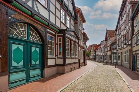 Alley in old town with half-timbered houses Hameln Germany