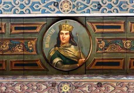 The wooden ceiling of the Upper Town Hall is painted with medallions of German emperors and kings,