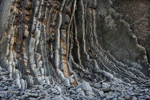 Geological formation of sandstone and limestone layers, Flysch on Itzurun Beach in Zumaia, Spain