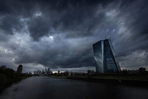 Dark rain clouds in the sky over the European Central Bank (ECB) in Frankfurt am Main, Frankfurt am