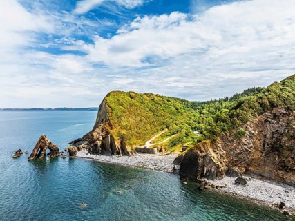 Blackchurch Rock and Cliffs over Mouthmill Beach from a drone, North Devon Coast, Devon, England,