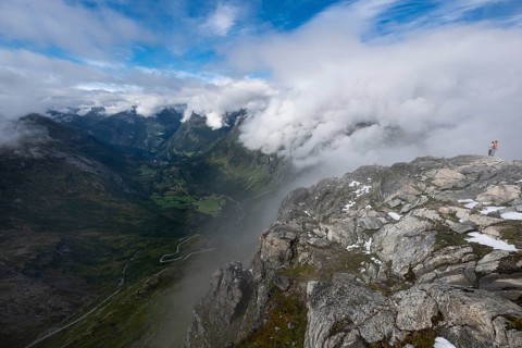 Famous curvy mountain road Fylkesvei 63 or Geirangervegen, which leads from Geiranger to the