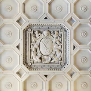 View from bottom to top of the stucco ceiling of the ballroom with Bremen key in the New Bremen