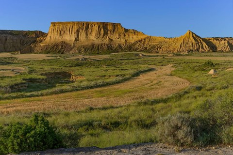 Bizarre rock formation in evening light in Bardenas Reales nature park Park, Navarra, Spain