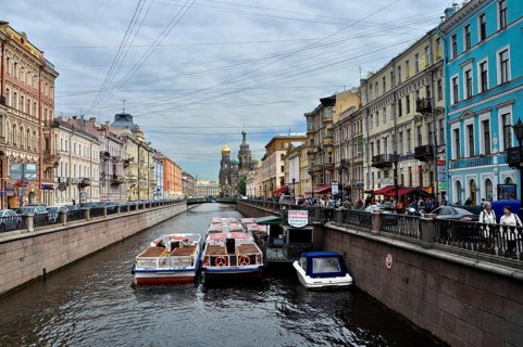 Boats in the Griboyedov Canal, canal, between colorful urban buildings, Saint Petersburg, St.
