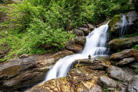 Waterfall and stone men, Mühldorfer Bach flows through the Barbarossa Gorge, long exposure,
