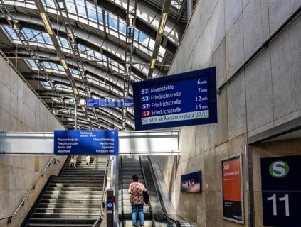 Blue information displays on the escalators leading to the platform at Berlin's Ostbahnhof, Berlin,