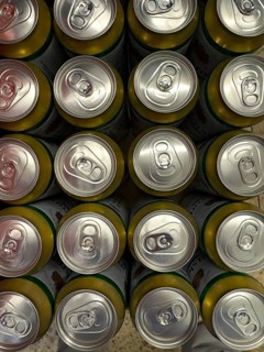 View from above of many aluminum beverage cans Aluminum cans for drinks with rip tab Ring pull ring