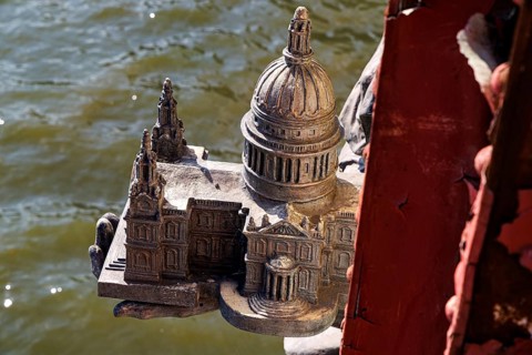 Secret London. An intricately cast miniature of St Paul's Cathedral rests in the hand of the bronze