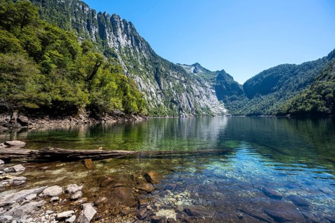 Laguna Triángulo with reflection between mountains, Parque Nacional Alerce Andino, Llanquihue, Los
