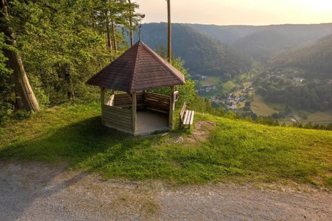 A wooden pavilion in a clearing with a relaxing view of a green valley, Simmelhütte, Bad Wildbad.