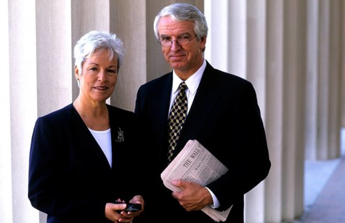 Businessmen, senior and senior citizen with the Wall Street newspaper in their arms, broker, broker