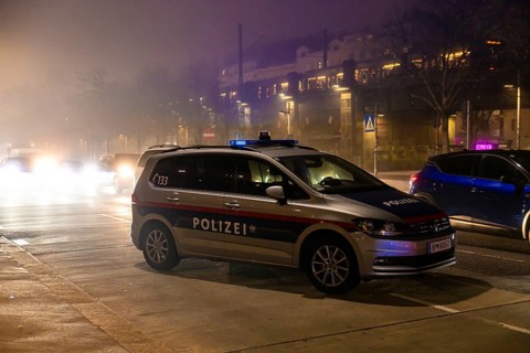 Vienna, Austria - 15 December, 2025: A police car parked on a street in Vienna, Austria, during a