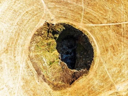 Top Down View of Trevone Round Hole over Trevone Bay from a drone, Trevone, Padstow, Cornwall,