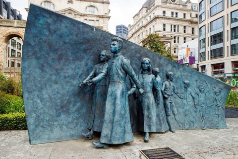 Andrew F Brown's bronze relief traces pupils through Christ's Hospital school, marking its 350