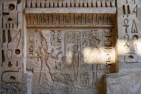Close up details of the reliefs and hieroglyphs inside Medinat Habu, the ancient Egyptian Mortuary