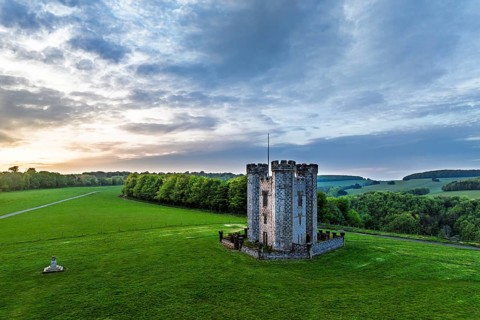 Sunset over Hiorne's Tower from a drone, Arundel, West Sussex, England, United Kingdom