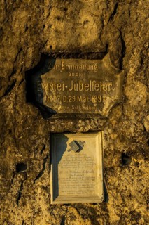 Sunrise on the Bastei Rock, memorial plaque for the Bastei celebration and the two pastors who