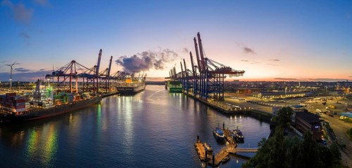 Panoramic aerial view at Waltershof harbour during the Blue Hour with Eurogate Container Terminal