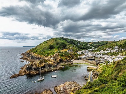 Polperro Harbour and Village from a drone, Polperro, Looe, Cornwall, England, United Kingdom