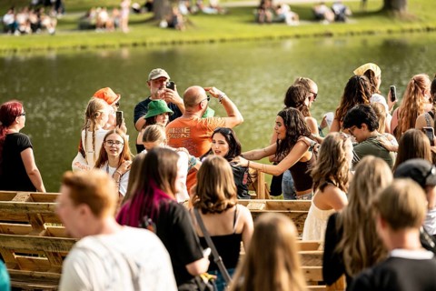 Festival goers celebrate in front of The Hideaway Stage during Yola's performance at the Superbloom