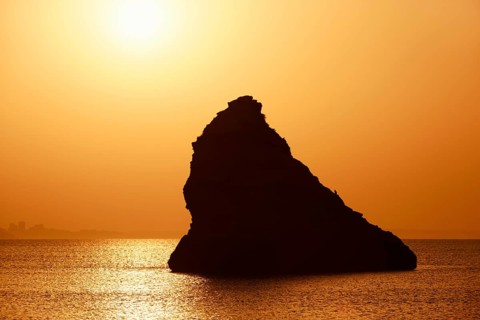 Rocks in the sea at sunrise, Praia Dona Ana, Lagos, Algarve, Portugal