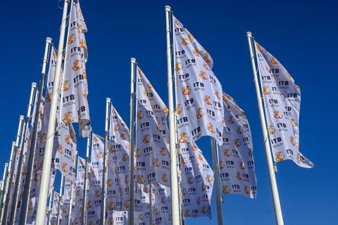 Flags in front of the ITB travel and tourism fair at the exhibition center, Messedamm,