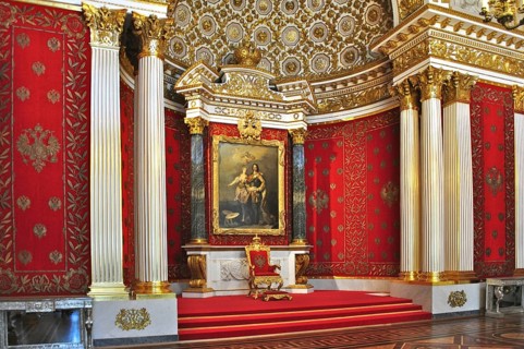 A magnificent throne room in the palace, decorated in red and gold with a painting, Winter Palace,