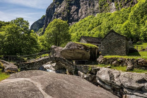 Traditional old stone houses and old stone arch bridge, Splueia Bella, near Foroglio, Val Calnègia,