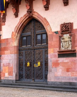Gilded ornaments on the gates to the entrance of the Old Town Hall in Frankfurt am Main, Hesse,