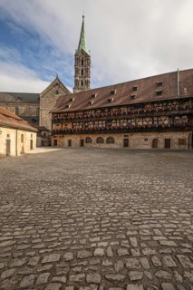 20 August 2026, The historic cobblestone courtyard of Alte Hofhaltung with the Bamberg Cathedral