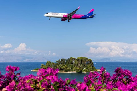 A Wizzair Airbus A321neo aircraft with the license plate 9H-WNY at Corfu airport, Greece