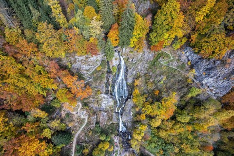 Todtnau Waterfalls multi-level waterfall in the Black Forest in autumn in Todtnau, Germany