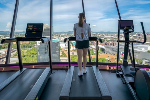 Hotel gym with panoramic views, Pattaya, Thailand