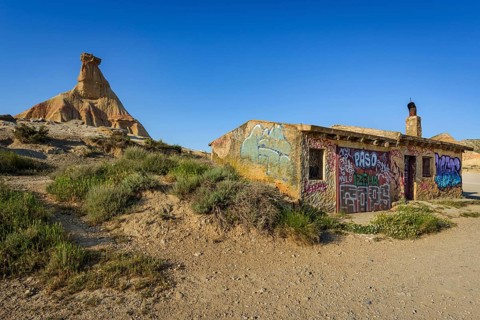 The Castil de Tierra monolith with shelter in the Bardenas Reales Natural Park, Navarra, Spain